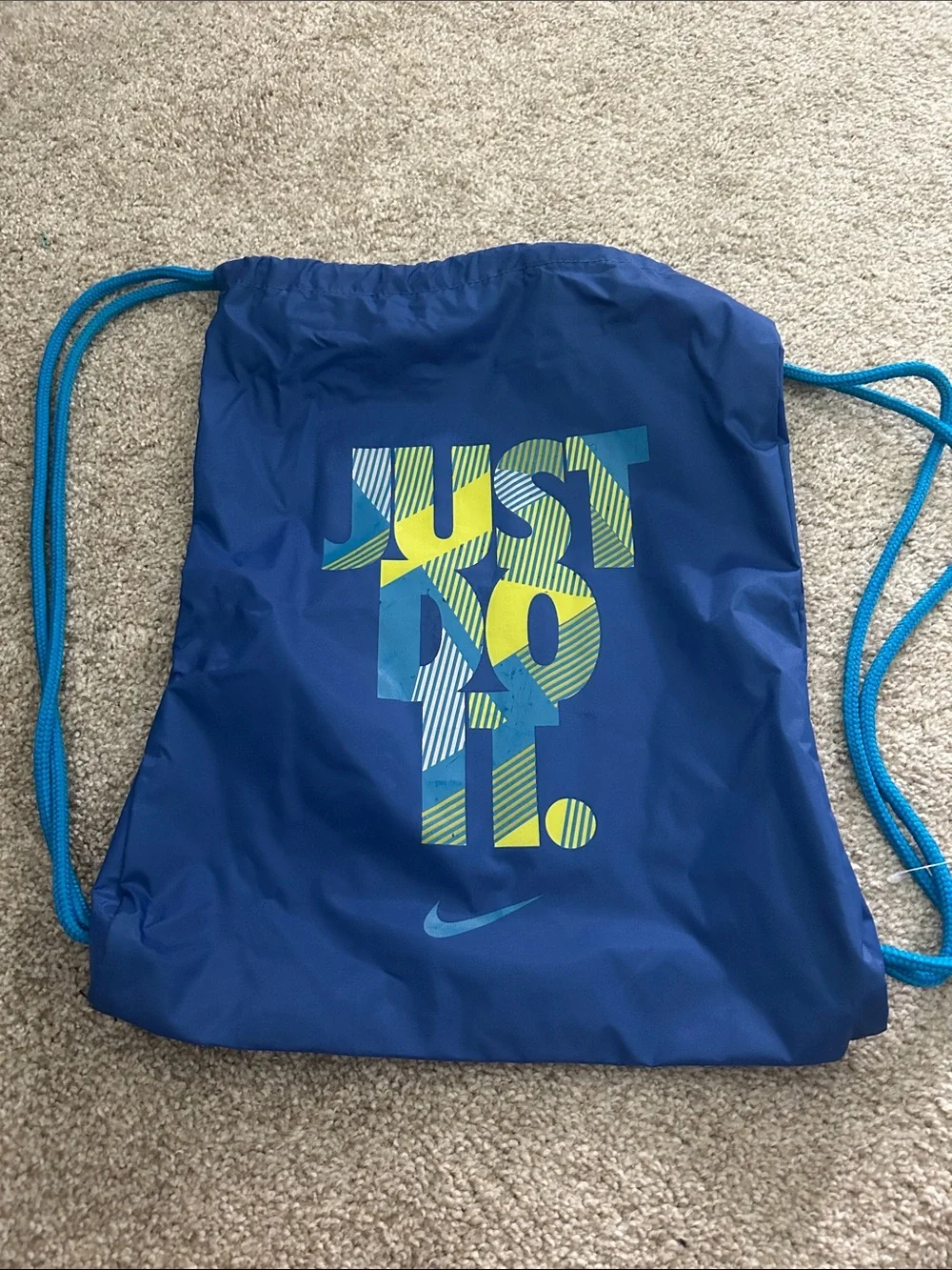 Vintage Y2K Nike Blue Drawstring Backpack with Neon Graphic